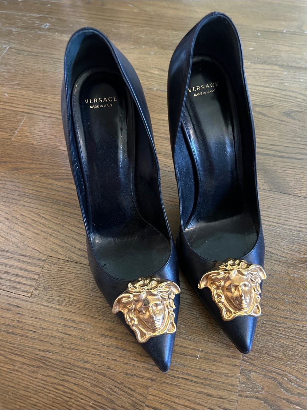 Versace Black Leather Pointed Pumps with Gold Medusa Plaques